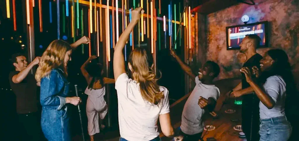 A group of young people cheering on a course