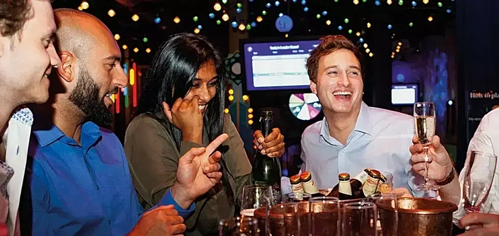 group of young adults enjoying some drinks