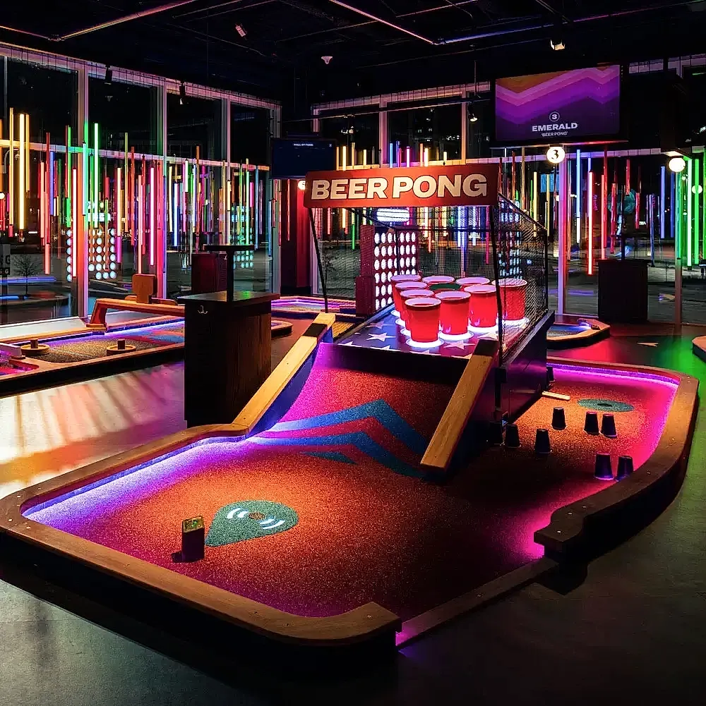 "Beer Pong" course all lit up under the Emerald course