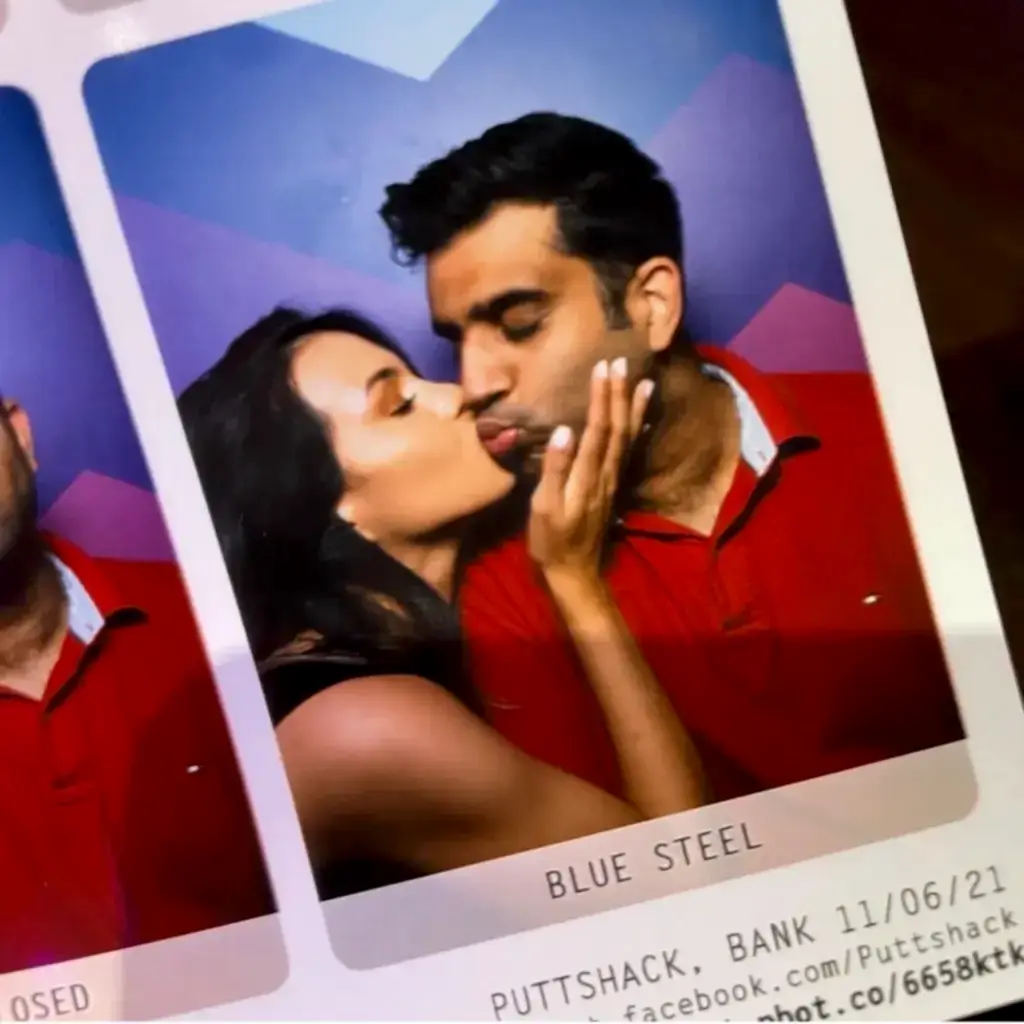 photobooth images of a happy couple smooching